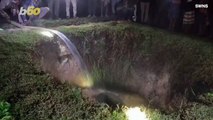 Must See! Rescuers Save Elephant Stuck in a Hole By Filling the Hole With Water