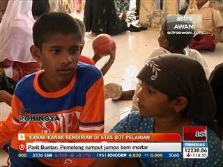 Kanak - kanak Rohingya sendirian di atas bot pelarian