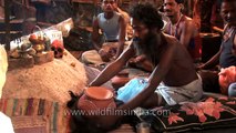 Aghori with a skull performing black magic - Haridwar