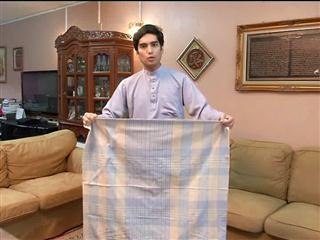 Looking sharp in traditional kain samping