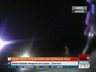 Lelaki bogel ditahan bawa lari kenderaan polis