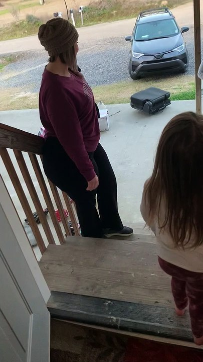 Sisters' Adorable Puppy Surprise