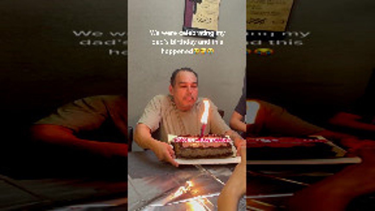 Dad Blowing Out Birthday Candles Loses Teeth