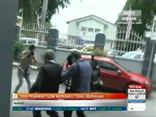 Dua pegawai TLDM mengaku tidak bersalah