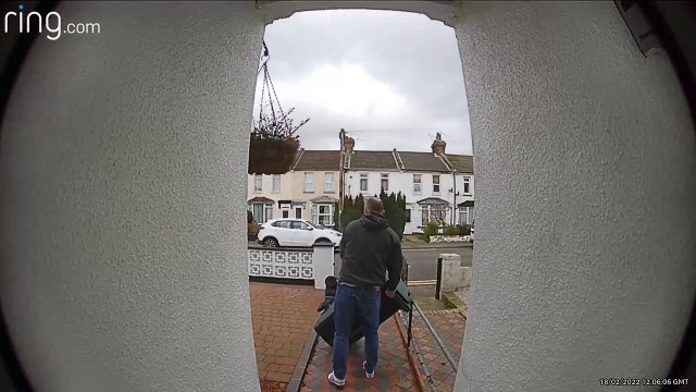 A doorbell camera has captured the moment a roof 'flew like cardboard' across a road in Ashford