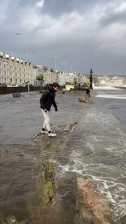 Guy Jumping Across Gap Gets Soaked by Tide