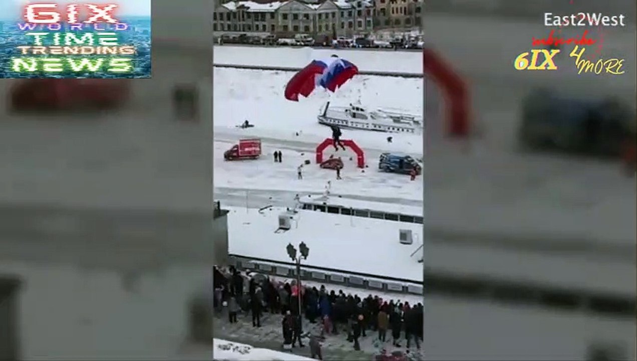 Hapless Russian soldier gets stuck on a sign at military event attended by Putin
