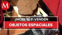 Ofertan objetos espaciales; lote incluye casa de perro golpeada por meteorito