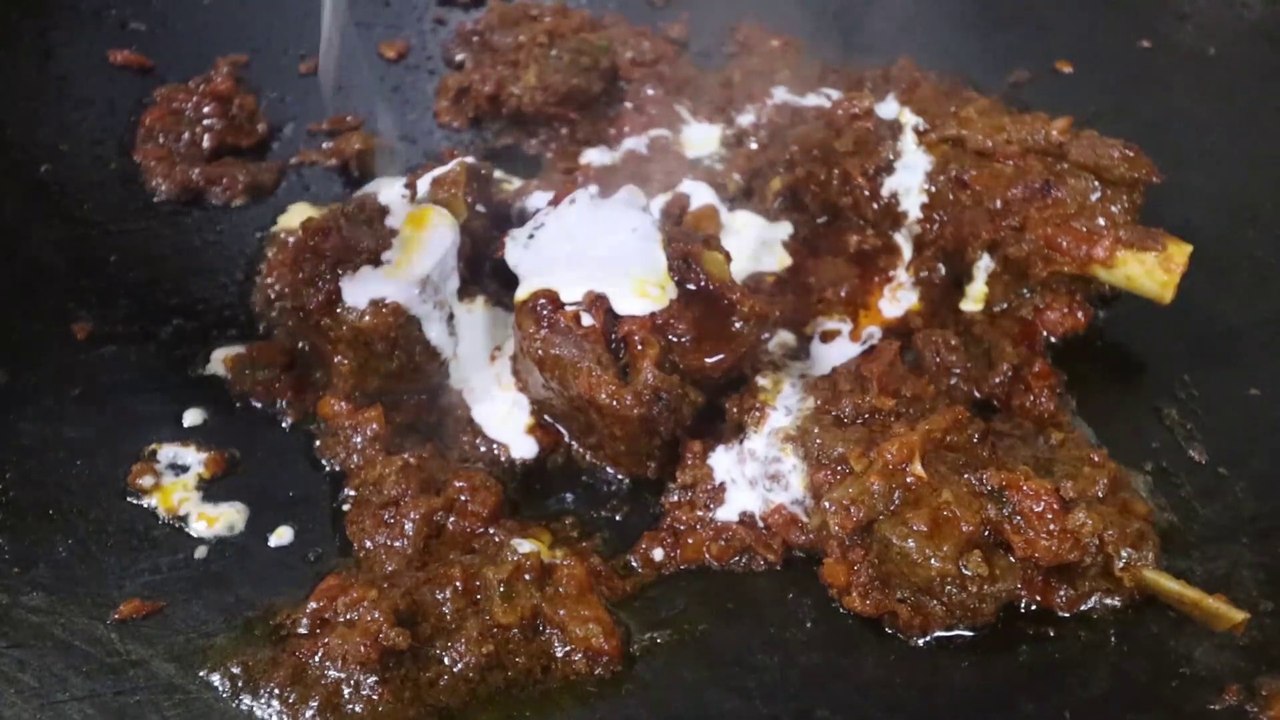 Delhi Street Food. Amazing Fish and Mutton on Street of Delhi  Made Live on an Indian Pan. Indian Food