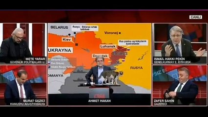 CNN Türk'te canlı yayınında kedi "Donbass" masaya çıktı
