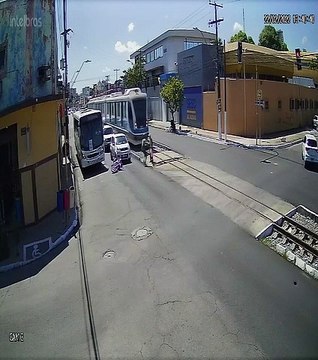 Biker Saves Old Lady Standing in the Tram Tracks