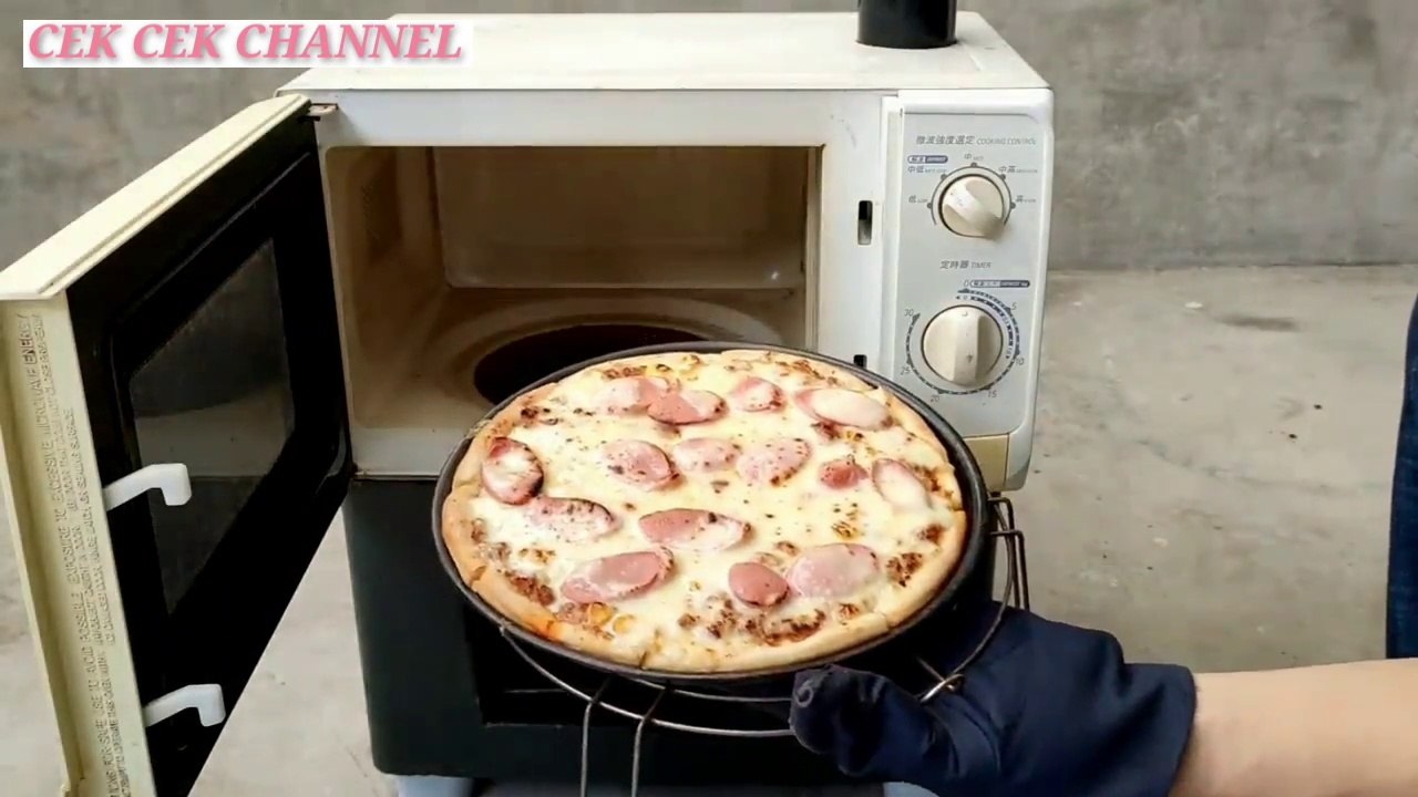 Oven kayu bakar dari microwave rusak. Sulap jadi tungku