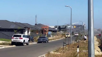 Helicopter collects water from Ballymanus estate to fight mulch fire | The Courier | 25 February 2022