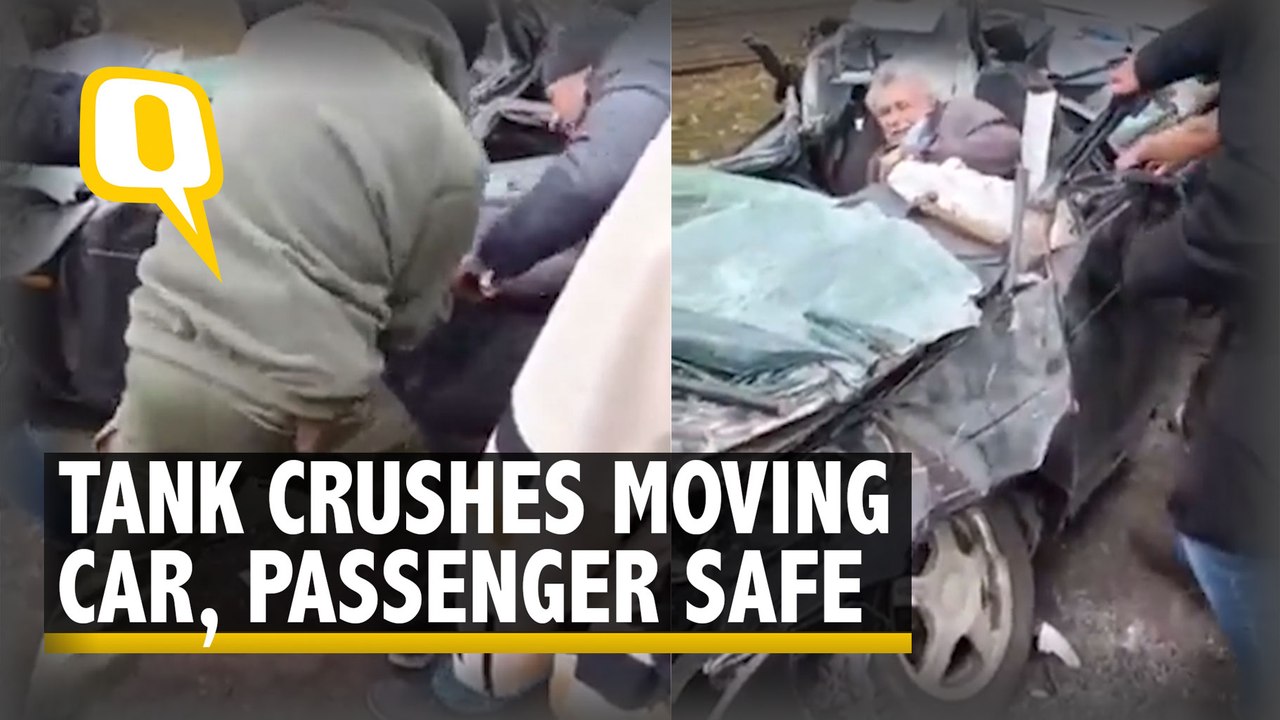 Watch | Ukraine Crisis | Russian Tank Crushes Car Outside Kyiv, Passenger Rescued Safely