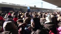 Shots fired into the air as people frantically try to board trains out of Kyiv as Russians approach