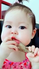 Asian baby eating