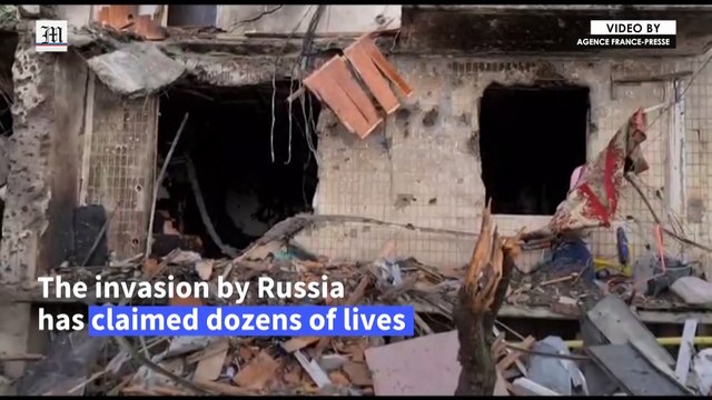 Kyiv residents wake up to destruction after first Russian troops hit city