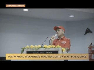 Tun M mahu mekanisme yang adil untuk teksi biasa, Grab