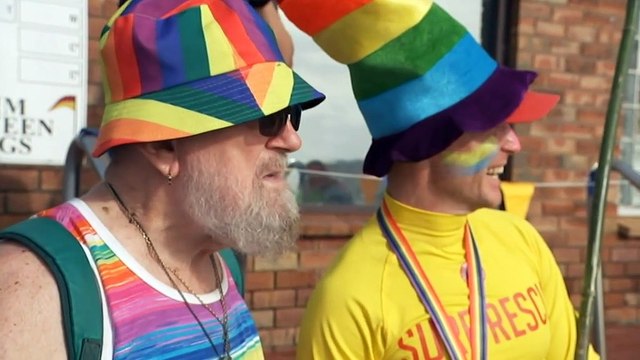 Lifesavers trade club colours for rainbow ahead of Sydney's Mardi Gras