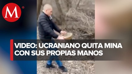 Ucraniano se deshace de una mina antitanque con sus propias manos