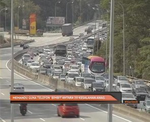 Memandu guna telefon bimbit antara 20 kesalahan AWAS