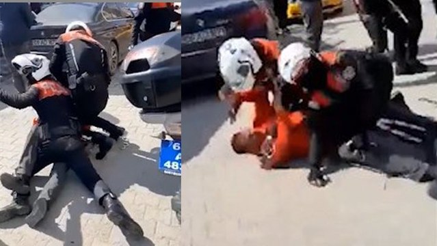 Gözaltı işlemine tepki gösterenlerle polis arasında arbede