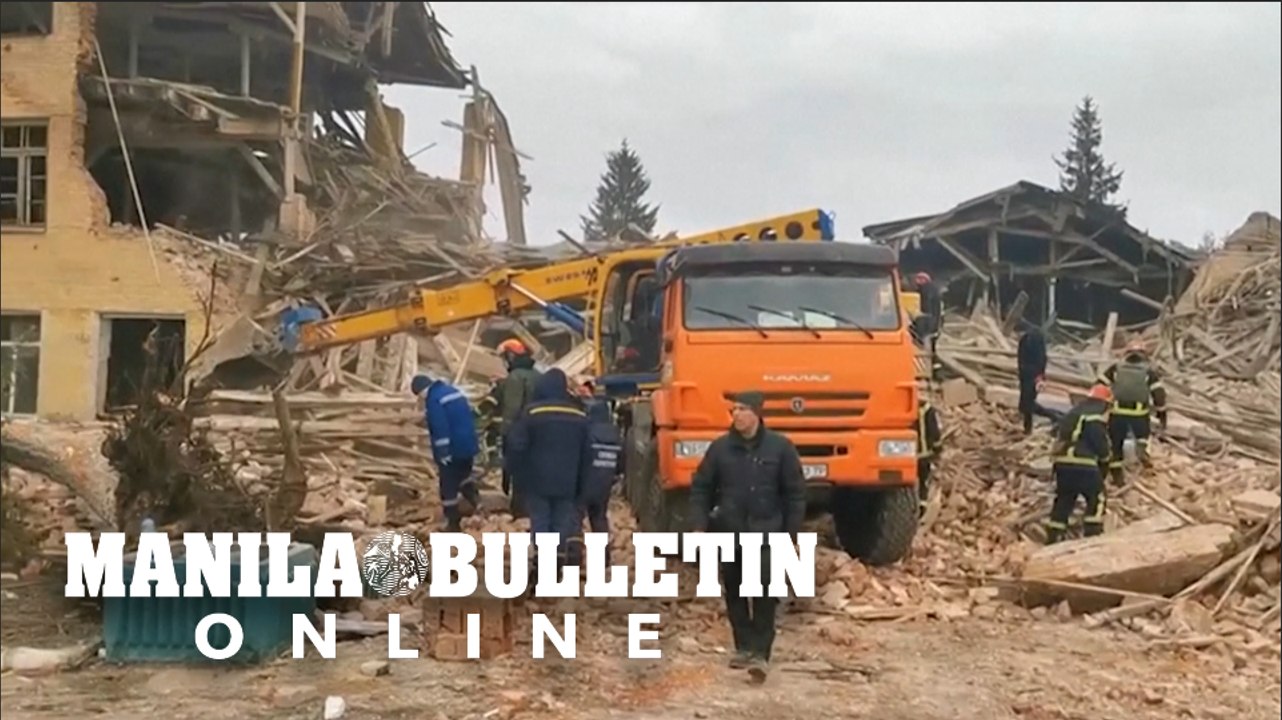Rescue services on scene after building destroyed in northeastern Ukraine