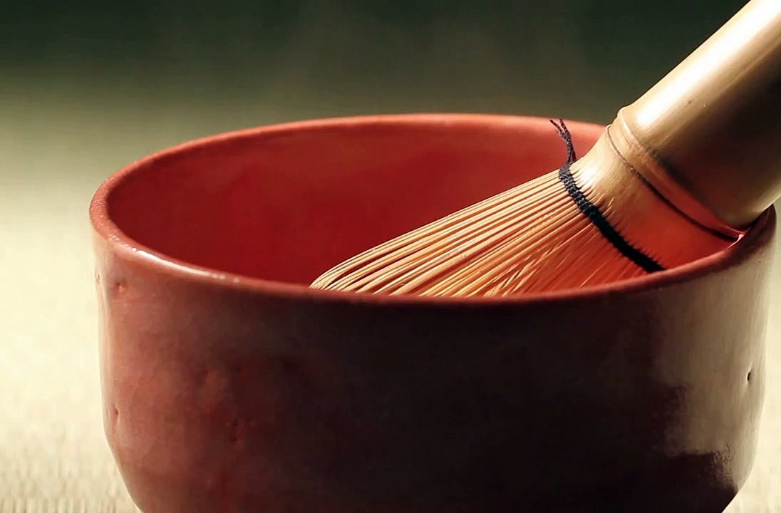 A brown cup with hot liquid