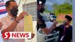 Johor polls: Johor Muda chief gets RM1,000 fine for fist bump