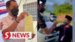 Johor polls: Johor Muda chief gets RM1,000 fine for fist bump