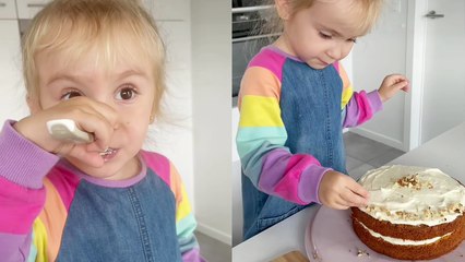 'Supremely skilled 4 y/o girl bakes a yummy, rich carrot cake '