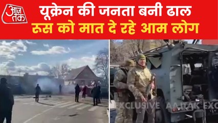 Ukrainian citizens stood unarmed in front of Russian tank