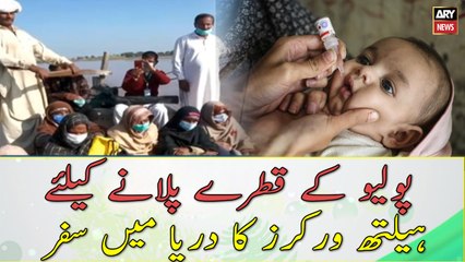 Health workers travels in the river to give Polio Drops