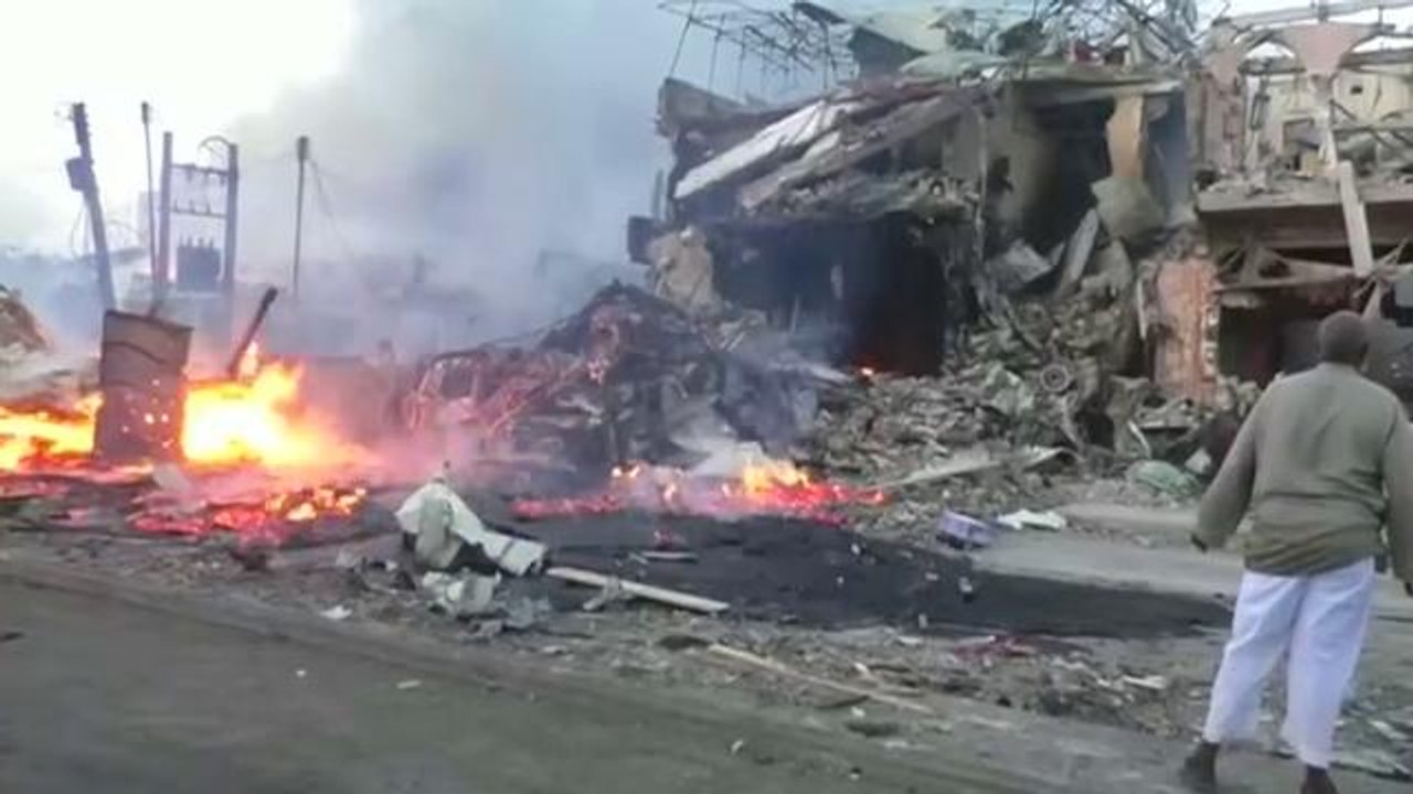 Dual car bombs kill at least 22 in Somalia's capital