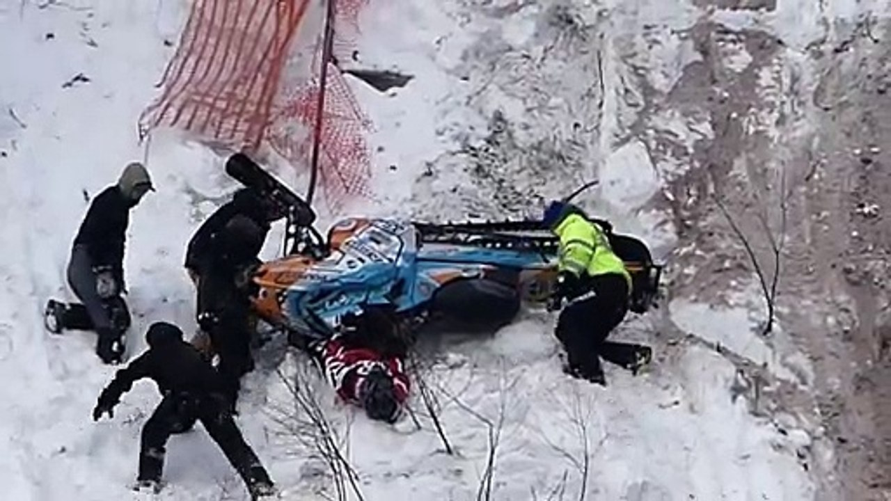 Pinned Under Snowmobile During Race