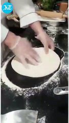 Baking pizza at Carrefour Bio in-store farm