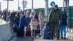 Thousands of Ukrainians seek refuge in Poland