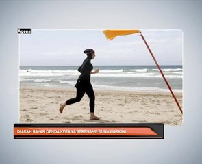 Diarah bayar denda kerana berenang guna burkini
