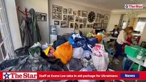Staff at Evans Lee take in aid package for Ukrainians