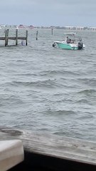 Boat Has Trouble Docking on Windy Day