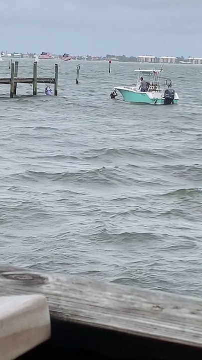 Boat Has Trouble Docking on Windy Day