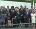 French President Macron makes sure disabled committee president gets front place in group photograph