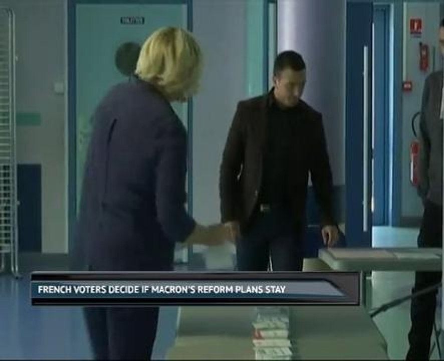 French voters decide if Macron's reform plans stay