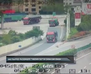 Unstrapped passengers thrown out in China car crash