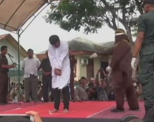 Two men publicly caned for gay sex in Indonesia