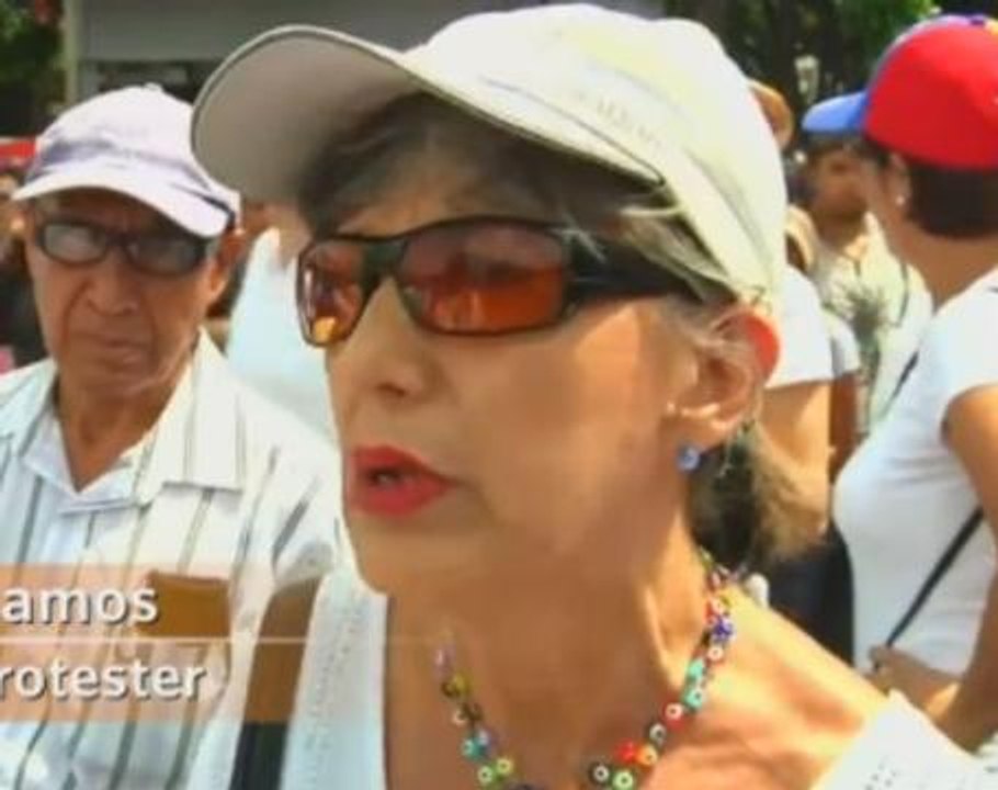 Roses in hand, Venezuelan women protesters face...