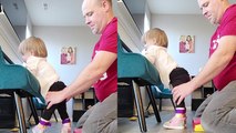 'Determined dad helps partially paralyzed daughter with practicing standing *INSPIRATIONAL*'