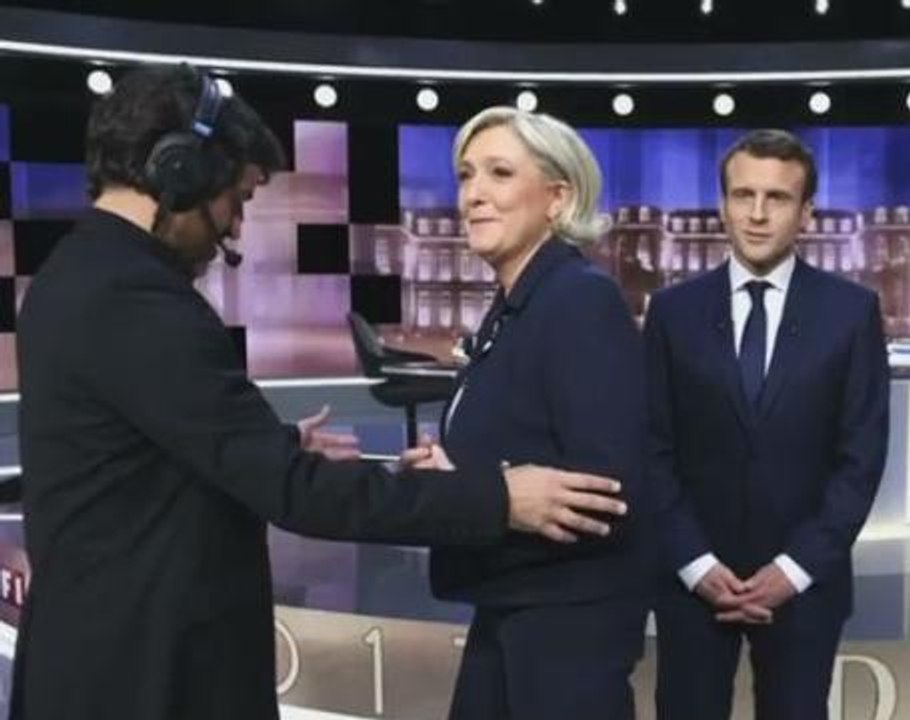 Macron supporters watch heated debate with Le Pen