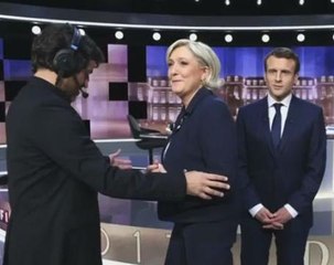 Macron supporters watch heated debate with Le Pen