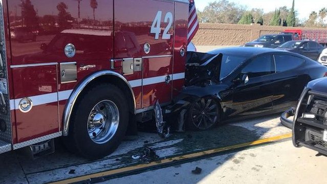 A Tesla Model S on Auto-Pilot Slams Into a Stationary Fire Engine